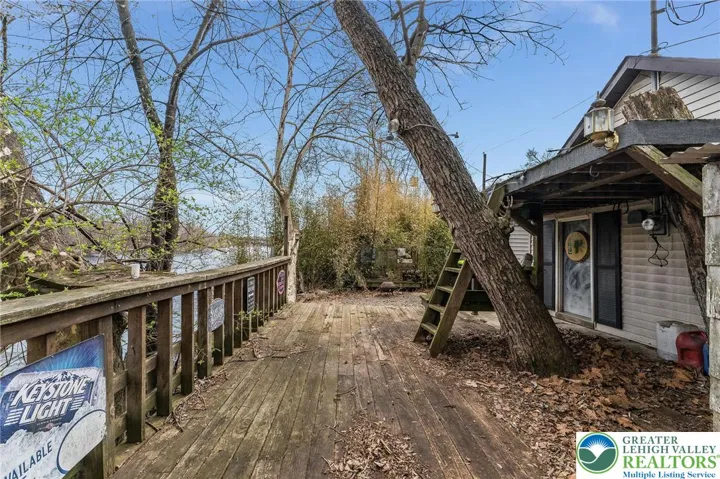 outdoor deck behind garage overlooking River