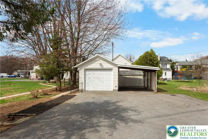 one car garage, new overhead door with car port
