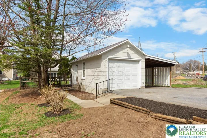one car garage, new overhead door with car port