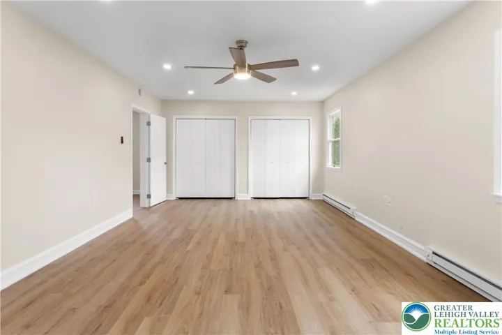 Primary bedroom- new electric baseboard heat
