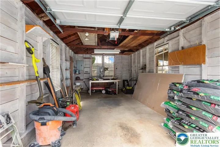 one car garage, new overhead door with car port