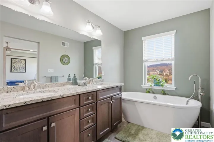 Well-appointed full bathrooms with updated finishes