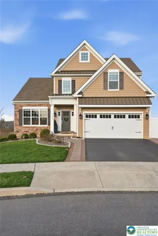 Beautifully maintained home with strong curb appeal in sought-after Stone Hill Meadows