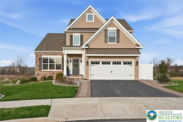 Welcoming front elevation with timeless design and upgraded exterior details