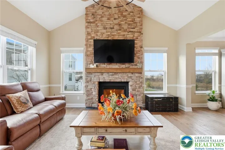 Bright, inviting entryway with soaring ceilings and natural light