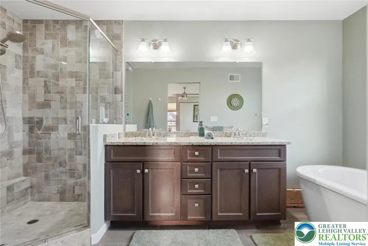 Well-appointed full bathrooms with updated finishes