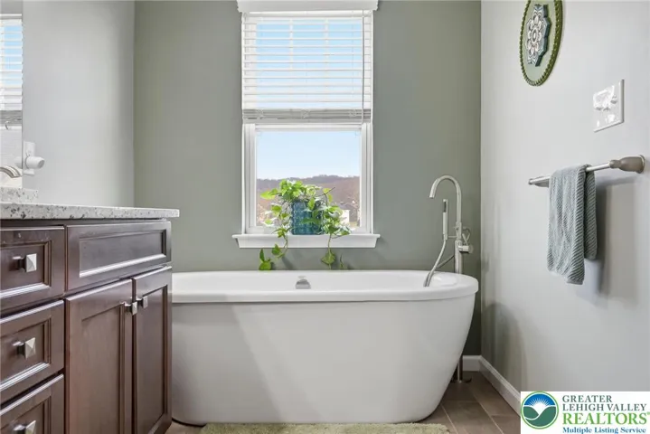 Well-appointed full bathrooms with updated finishes