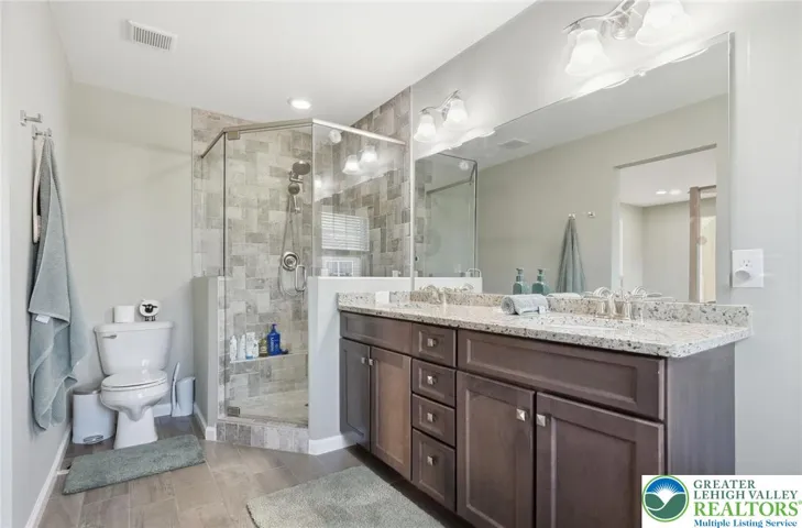 Updated bathrooms with modern finishes and thoughtful design