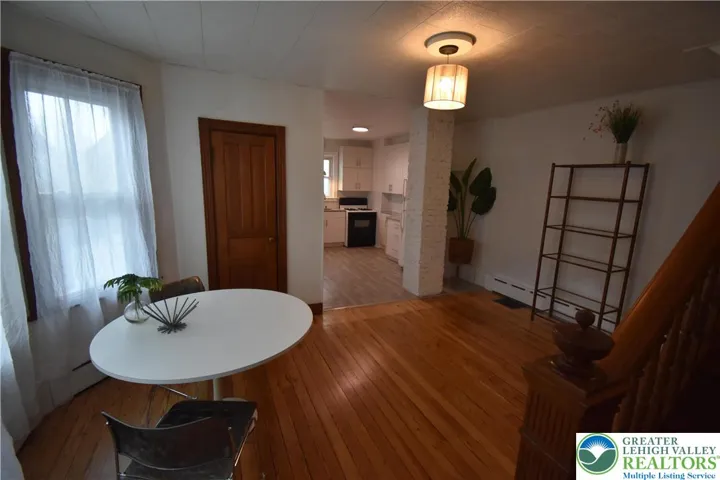 Dining Room with open staircase to 2nd floor