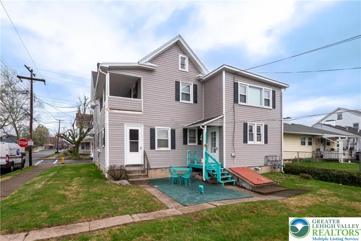 Rear Exterior - Yard and Building View