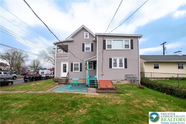 Rear Exterior - Yard and Building View