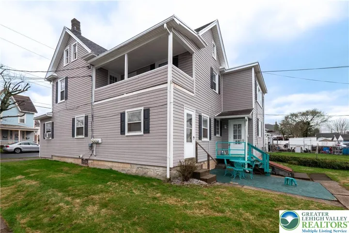 Rear Exterior - Back Porch and Balcony