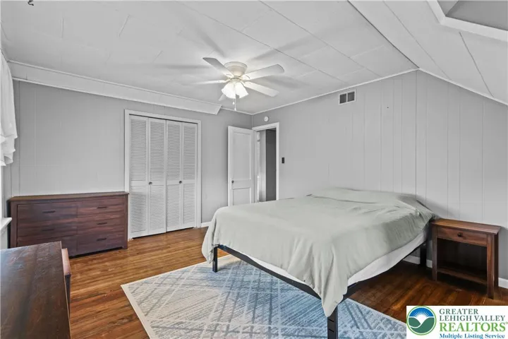 Bedroom #2 w/ Hardwood Floors and Cozy Slanted Ceilings