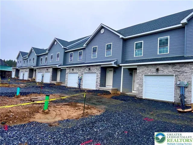 9 town homes, move in late spring.
