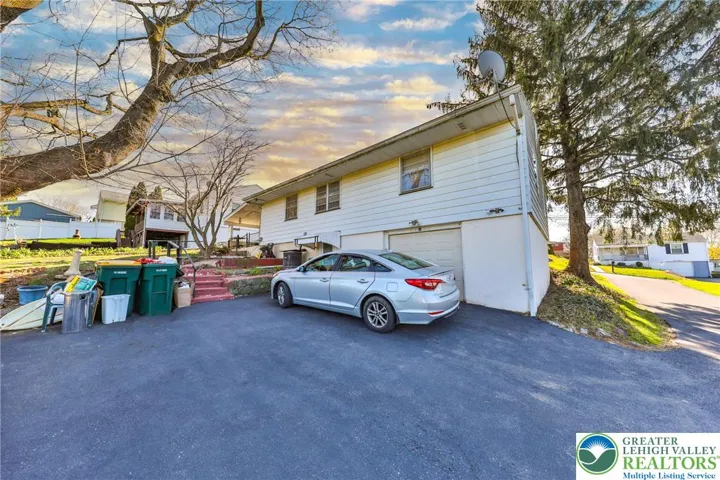Ample Parking in Rear - Garage to Right