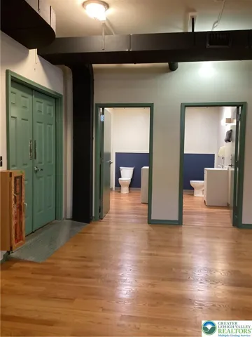 Double-door entrance to rear private room.