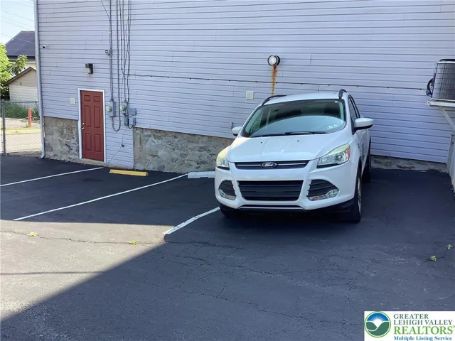 Three dedicated parking spaces.