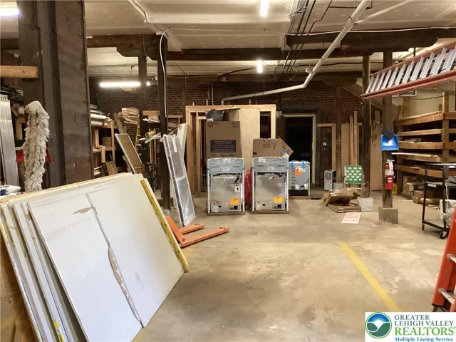 Basement / shop, towards rear (right).