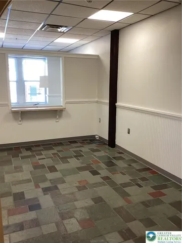Vestibule with partition wall towards front.