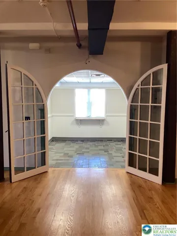 Unique doors to vestibule area.