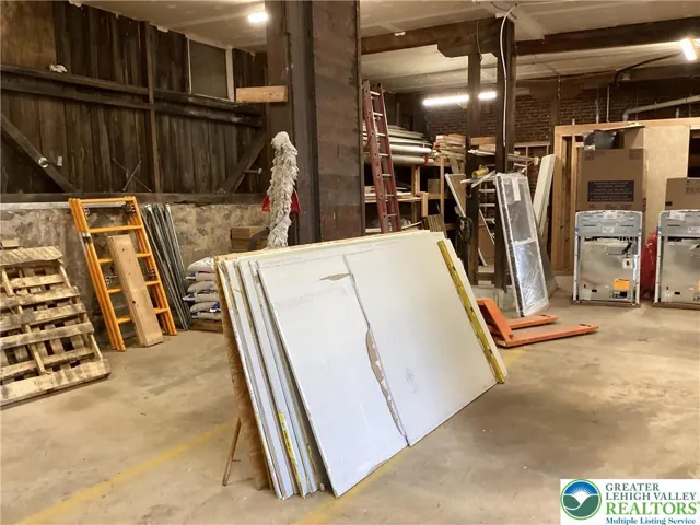Storage / shop, towards rear (left).