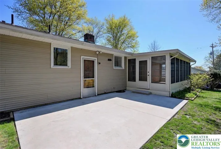Patio To Sunroom & Full Basement