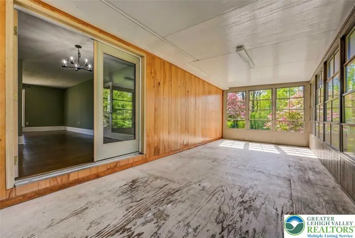 Spacious Sunroom To Dining Area
