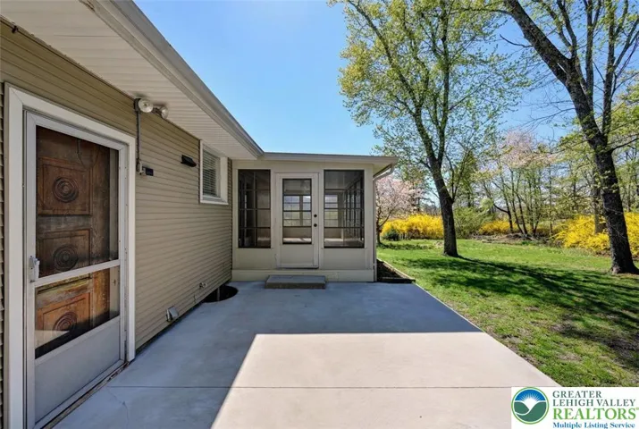 Patio w/ Basement & Sunroom Access