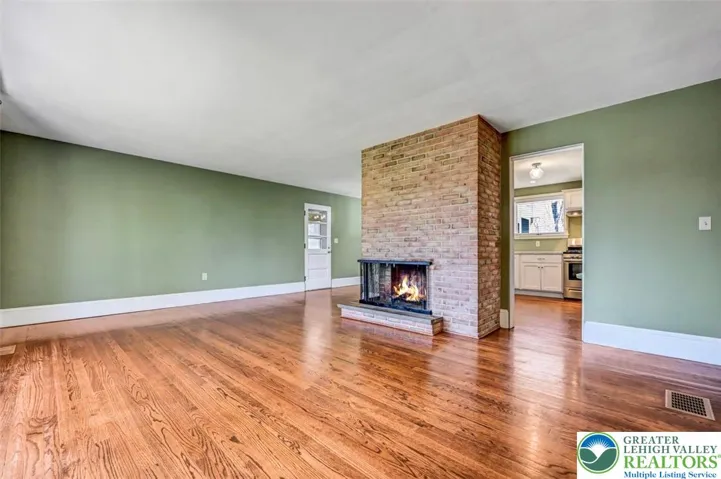 Floor To Ceiling Brick Fireplace