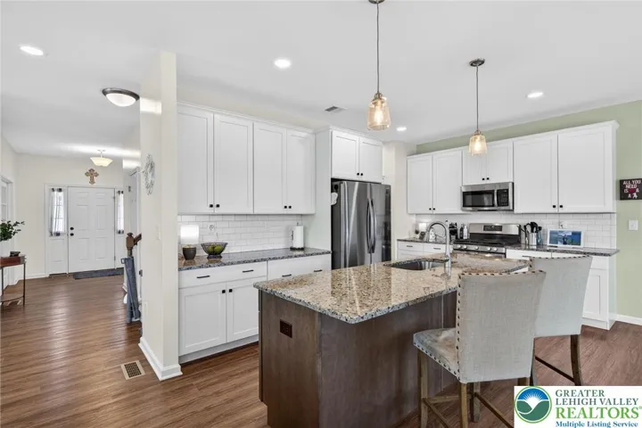 Modern two tone warm cabinets