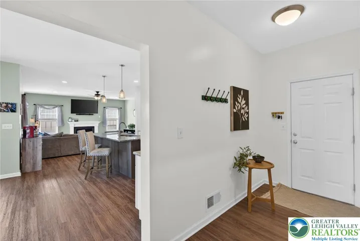 Drop zone off garage with extra coat closet