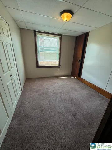 Bedroom with attic access
