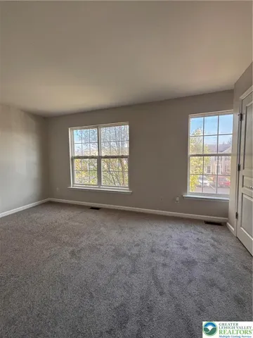 Second bedroom with double door closet.