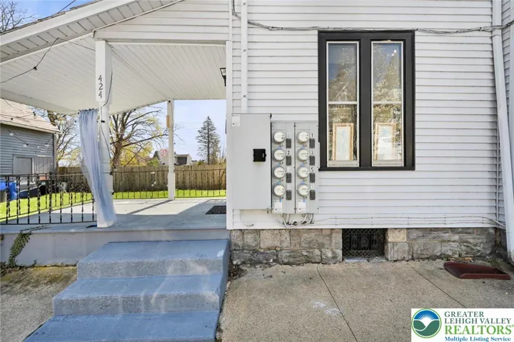 Unit 424 Cov porch entrance. Complete reno 2024.