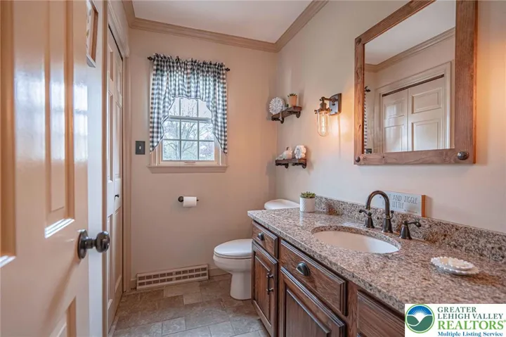 Full bath has shower stall