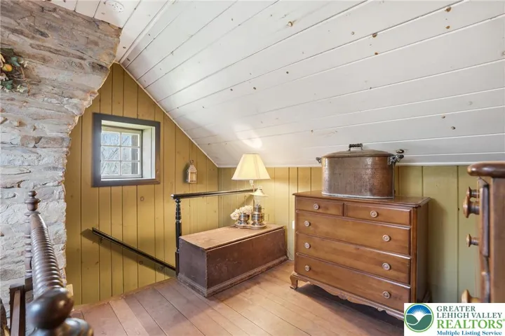 Wood floors, natural light, original stone walls