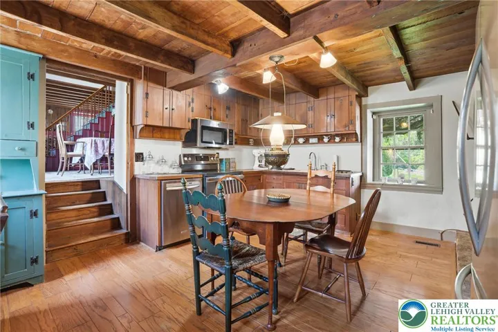 Original wood plank floors, natural wood ceilings