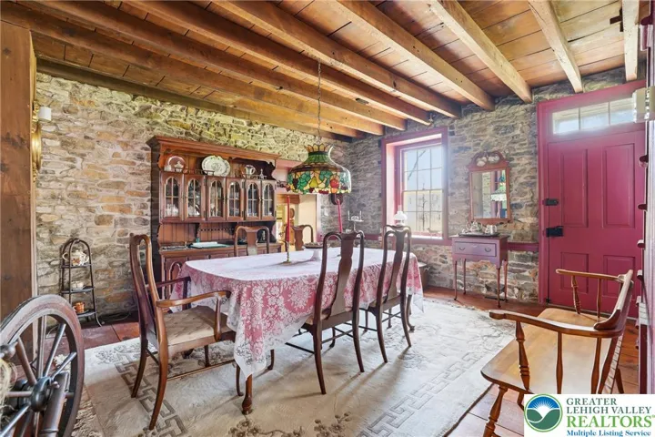 Original wood plank floors, natural wood ceilings, original stone walls