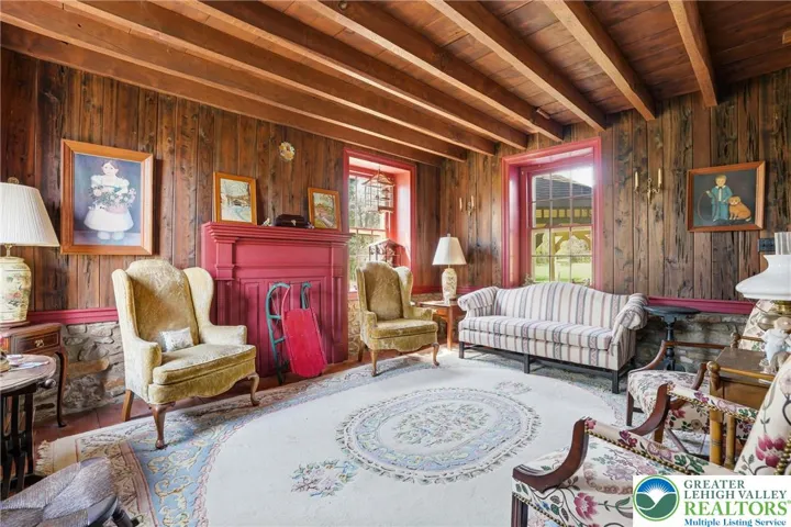 Original wood plank floors, natural wood ceilings, original stone walls, deep windowsills