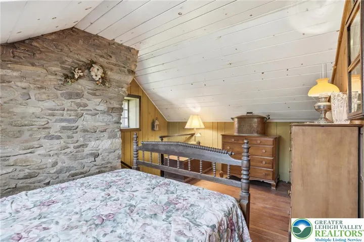Wood floors, natural light, original stone walls