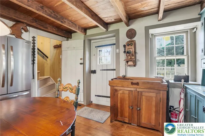 Original wood plank floors, natural wood ceilings