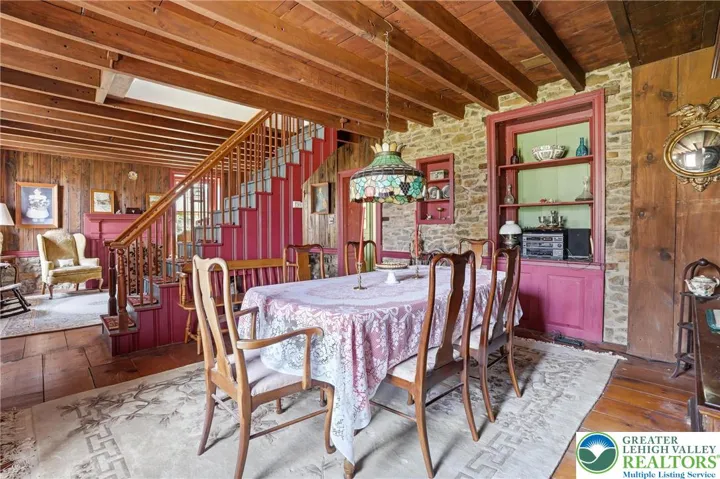 Original wood plank floors, natural wood ceilings, original stone walls