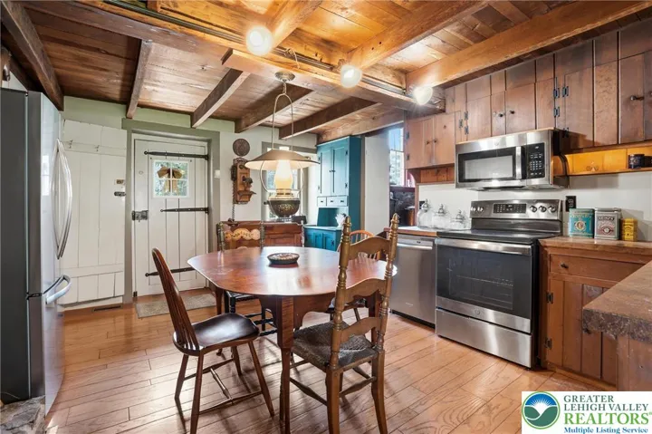 Original wood plank floors, natural wood ceilings