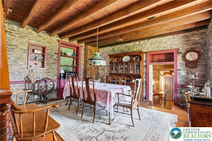 Original wood plank floors, natural wood ceilings, original stone walls
