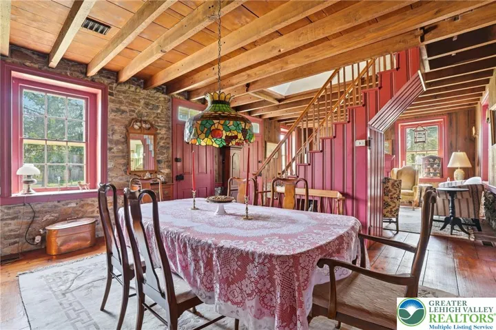 Original wood plank floors, natural wood ceilings, original stone walls