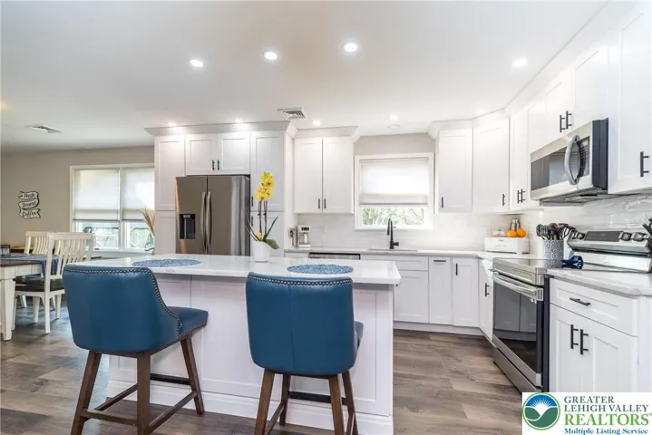 Dream Kitchen with white tops and S/S