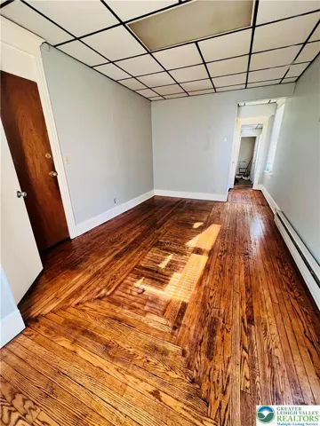 living room floors are lovely patterned hardwood.
