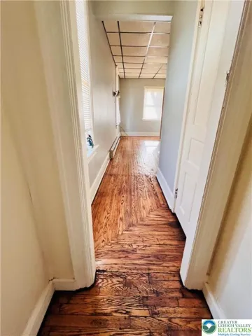 from kitchen looking past bath towards front living room