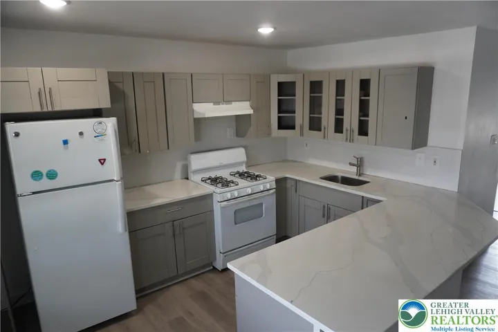 Kitchen with Newly Installed Granite Countertops
