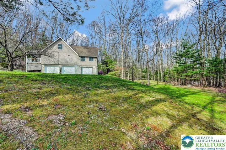 Country Setting w/ 3 Car Garage